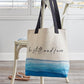 Canvas Tote Bag - Be Still and Know with calming blue wave design and black durable canvas straps hanging on dining chair | inside zippered pocket | oak7west.com