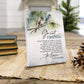 Decorative plaque with birds on a branch and text about great friends, placed on a woven mat with books and a pine cone. | oak7west.com