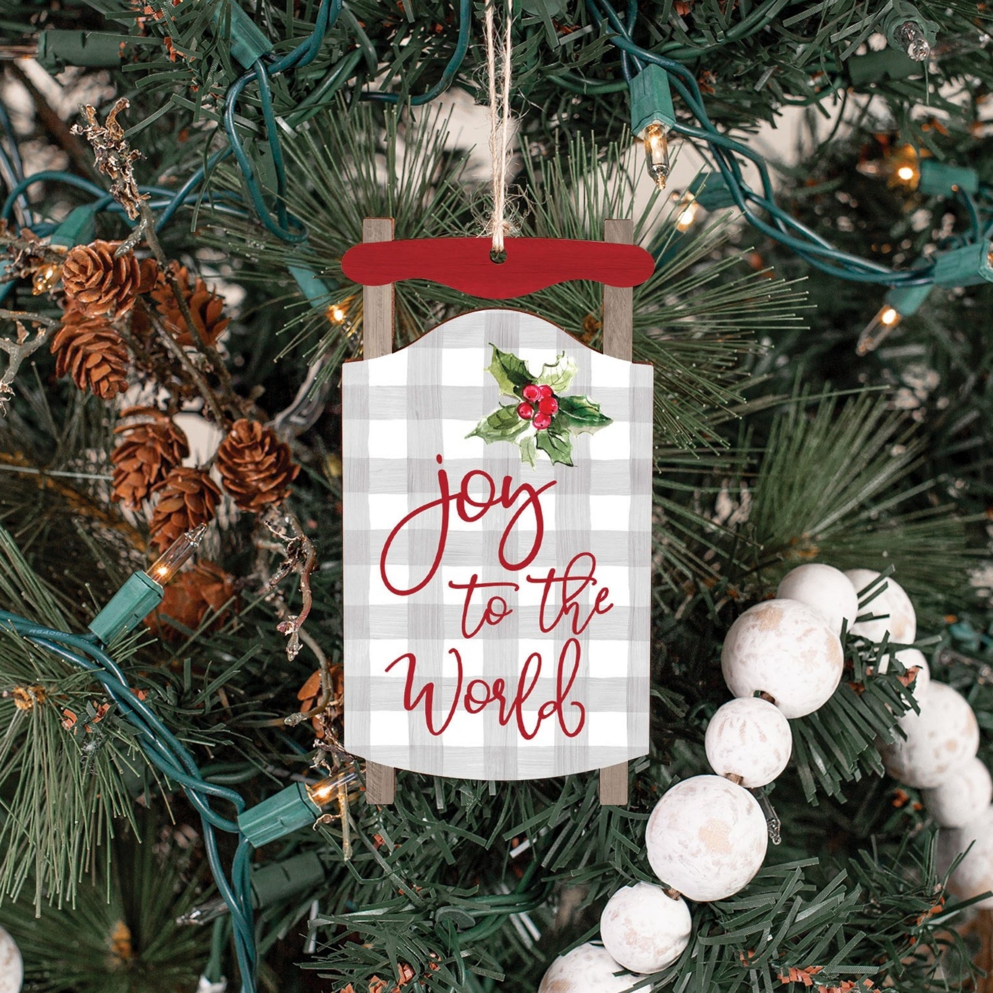 Joy to the World Sled Shaped Christmas Ornament for Tree or Wreath shown on woodland Christmas tree | oak7west.com