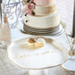 Love is Sweet top view - White Ceramic Cake Stand - Special Occasion Serveware for Wedding, Anniversary, or Bridal Shower | Ceramic dish with scalloped edge and gilded details reads... love is sweet shown with desserts | oak7west.com