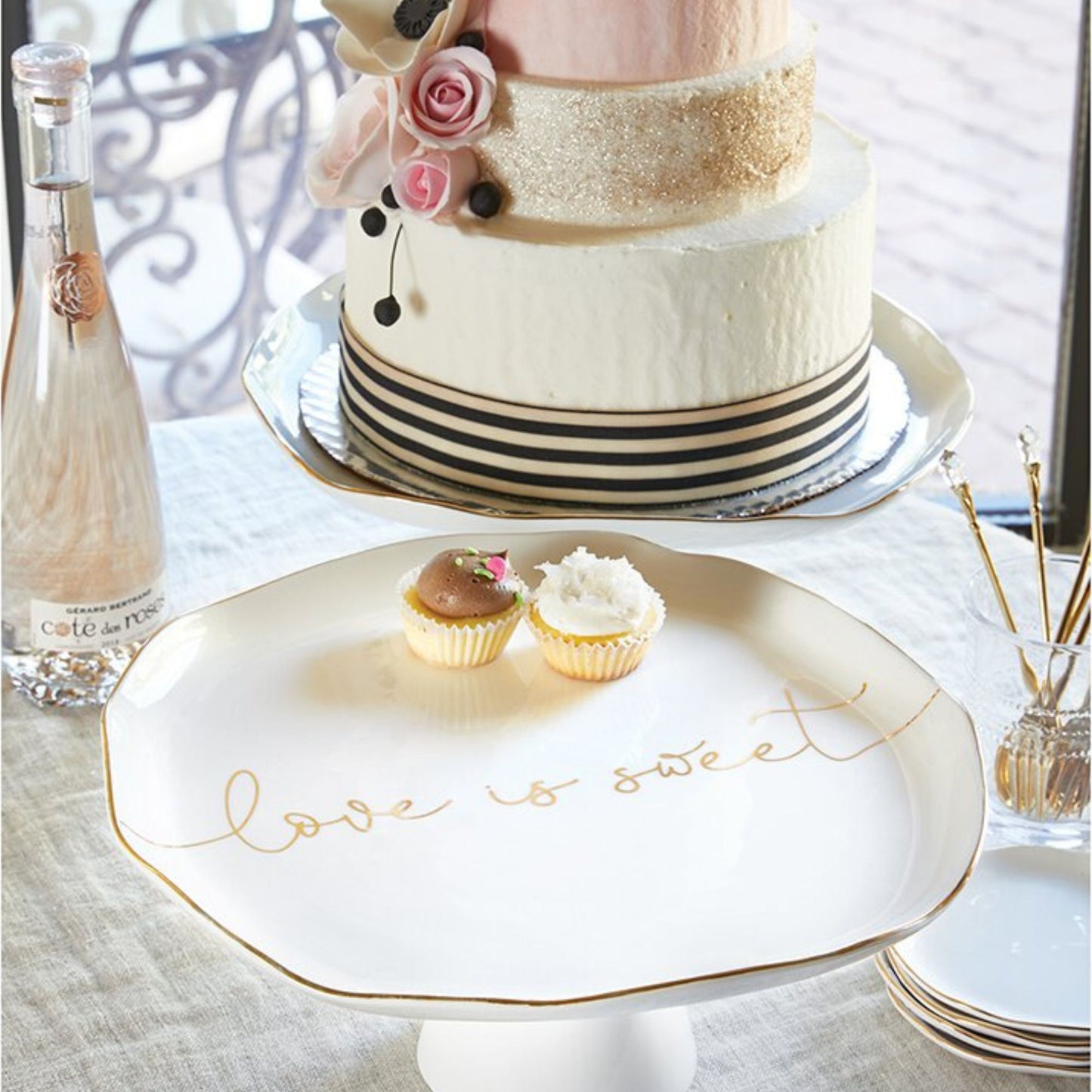 Love is Sweet top view - White Ceramic Cake Stand - Special Occasion Serveware for Wedding, Anniversary, or Bridal Shower | Ceramic dish with scalloped edge and gilded details reads... love is sweet shown with desserts | oak7west.com