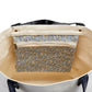 Floral-patterned zippered pouch inside a beige bag with black handles | Canvas Tote Bag with Inside Zippered Pocket and Black Vegan Leather Straps - Outside reads "Make Today Awesome" | oak7west.com