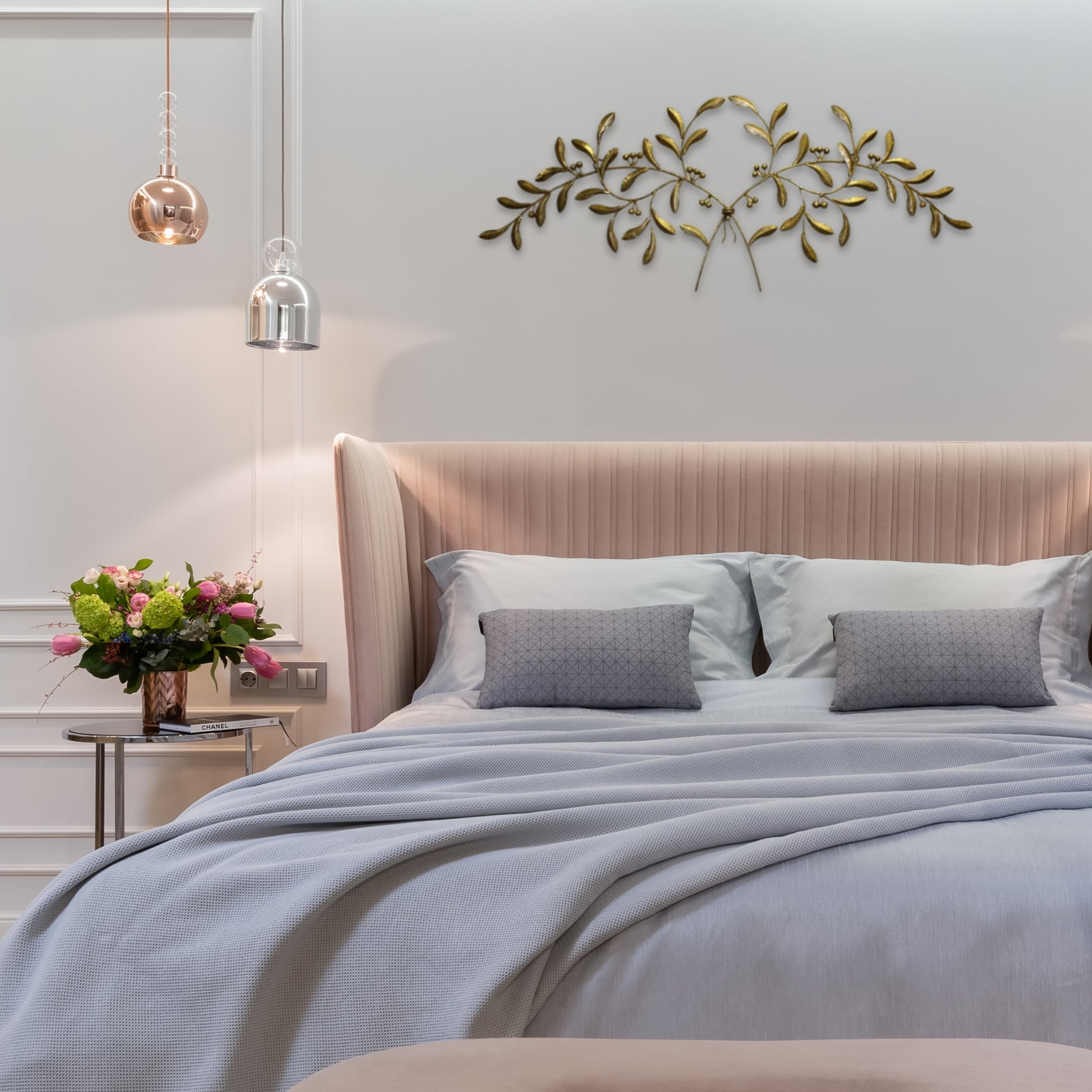 Italian Gold Olive Leaf Iron Wall Grille - Olive Branch Metal Wall Decor (42.5"W) over bed with grey bedding | oakwest.com