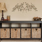 Red, Green, Gold Olive Leaf Iron Wall Grille - Olive Branch Metal Wall Decor (42.5"W) hung over console table with wicker baskets | oak7west.com