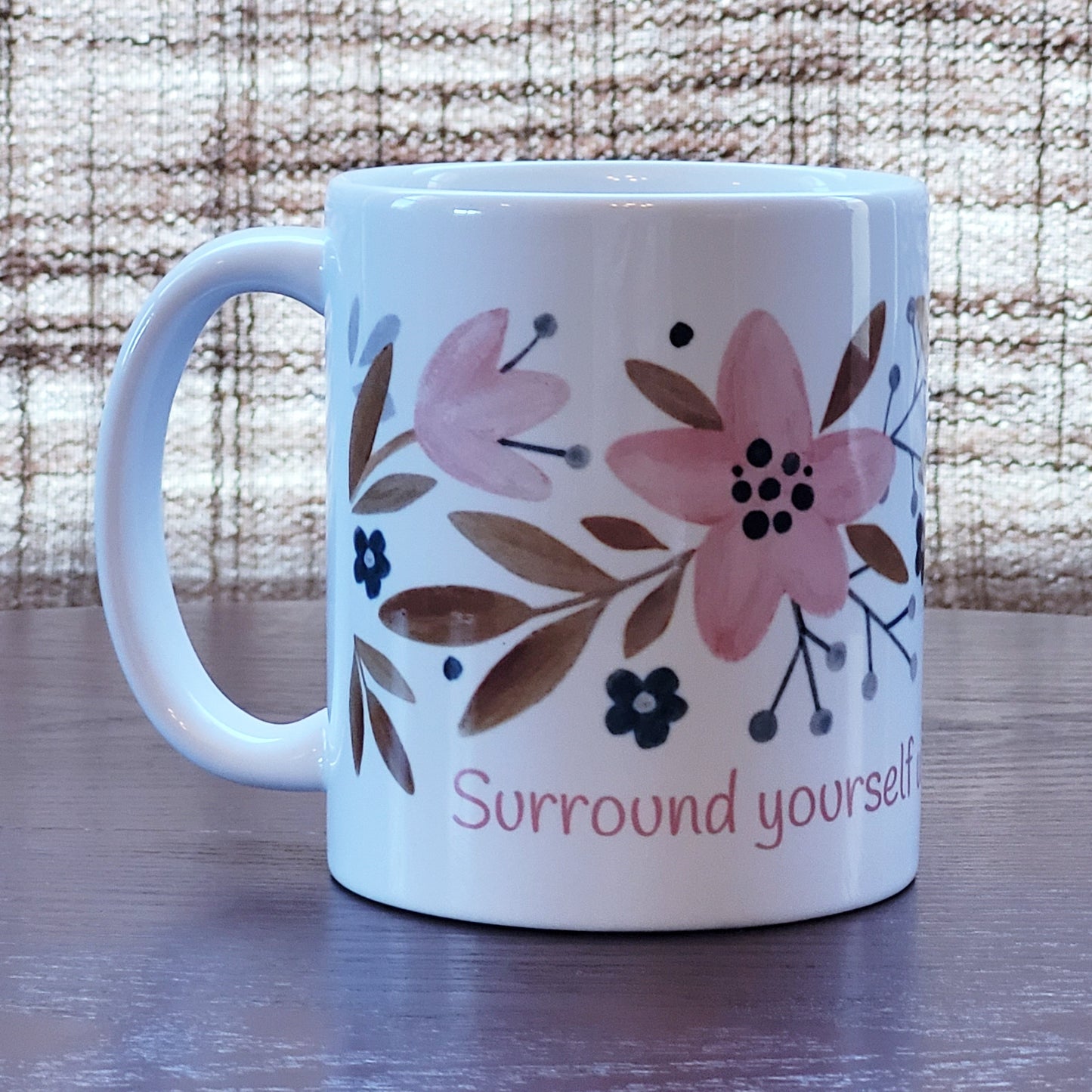 Surround yourself with what you love coffee mug (exclusive design) | lovely crisp white with a floral print in pinks, tans, and navy blue, finished off with the words "Surround yourself with what you love" in a fun pink font | 11 ounce coffee cup | oak7west.com