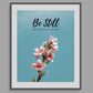 Inspirational Word Art - Be Still and know that I am God - Flower Design Wall Decor (8X10 print) choose from 2 text colors | shown with black text in medium gray frame on light gray wall | oak7west.com